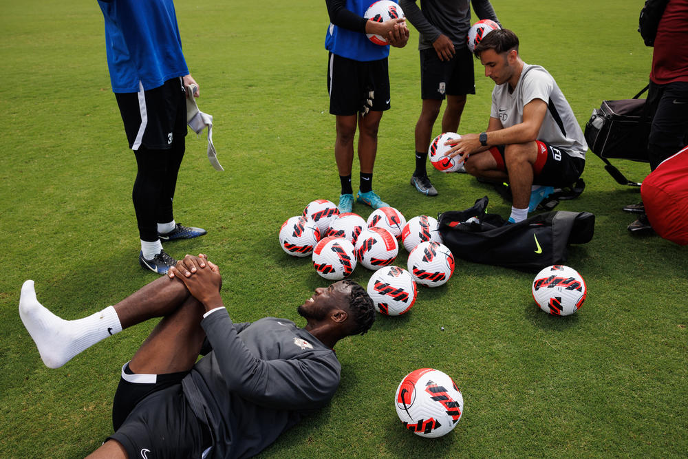 Sacramento Republic FC player Luther Archimède stretches after practice.