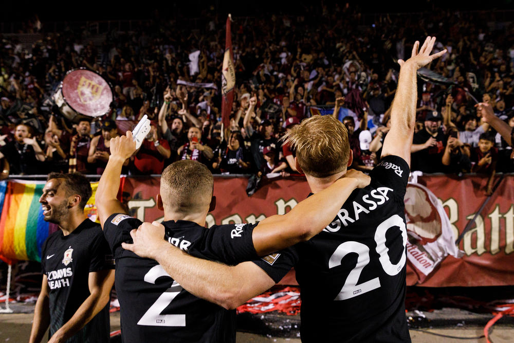 Sacramento Republic FC Players celebrate their U.S. Open semifinal overtime win against Sporting Kansas City in Sacramento, Calif.