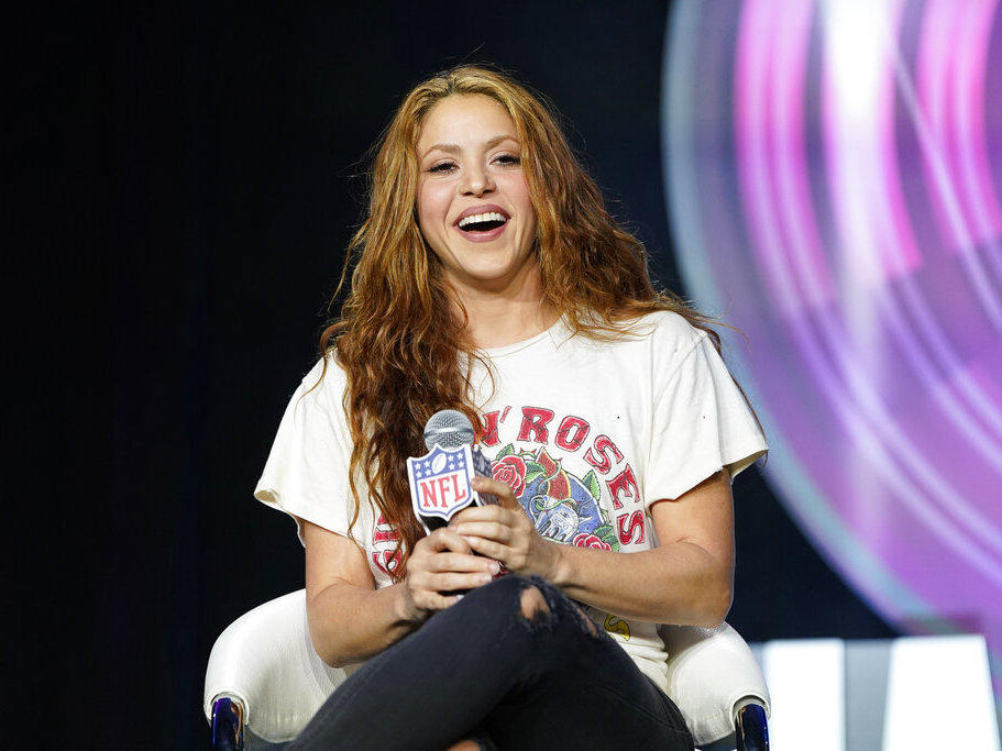 Performer Shakira answers questions at a news conference on Jan. 30, 2020, in Miami. Spanish prosecutors are seeking a prison sentence of eight years for Colombian-born pop star Shakira in her expected trial for alleged tax fraud. Shakira is charged for failing to pay 14.5 million euros ($15 million) in taxes in Spain between 2012 and 2014.