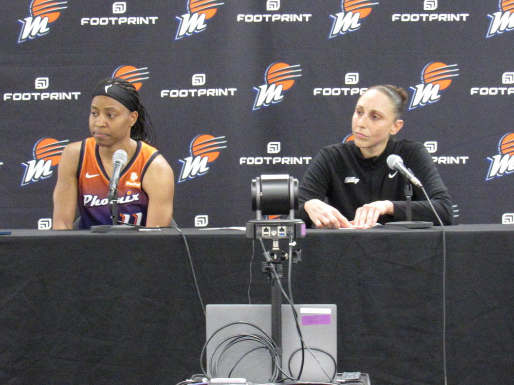 Mercury players Shey Peddy (left) and Diana Taurasi take part in a news conference after their team defeated the L.A. Sparks in Phoenix on Thursday.