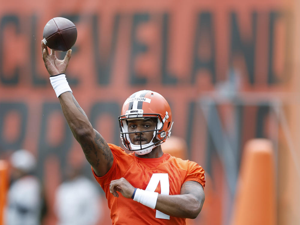 Cleveland Browns quarterback Deshaun Watson throws a pass during practice at the team's training facility in May in Ohio. The NFL suspended Watson for six games on Monday for violating its personal conduct policy following accusations of sexual misconduct.