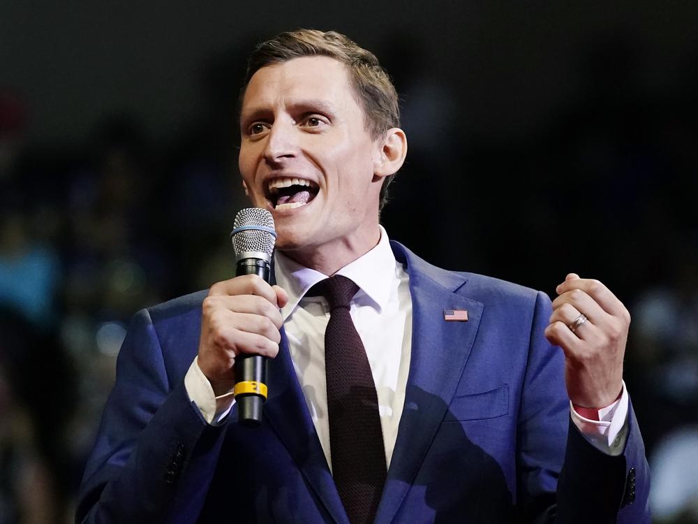 Blake Masters, a Republican candidate for U.S. Senate in Arizona, speaks at a rally hosted by former President Donald Trump on July 22 in Prescott, Ariz. The Trump-backed Masters is aiming to challenge Democratic Sen. Mark Kelly in the fall.