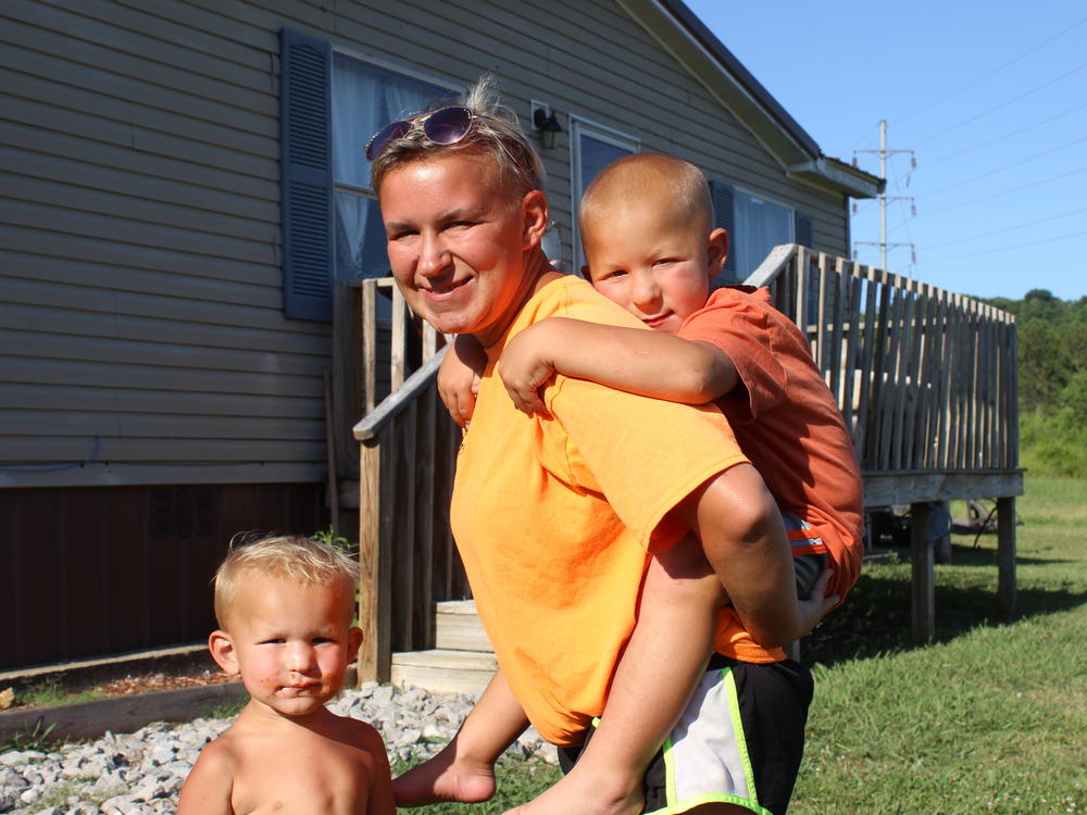 Tennessee's Medicaid program, TennCare, dropped Katie Lester and her son Mason (right), because of a clerical error in 2019. The Lester family was left uninsured for most of the next three years, including during the birth of youngest child Memphis (left).