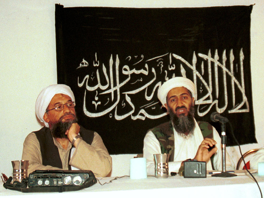 In this 1998 file photo, Ayman al-Zawahiri (left) holds a press conference with Osama bin Laden in Khost, Afghanistan. Zawahiri succeeded bin Laden as al-Qaida's leader following the 2011 U.S. raid that killed bin Laden in Pakistan.