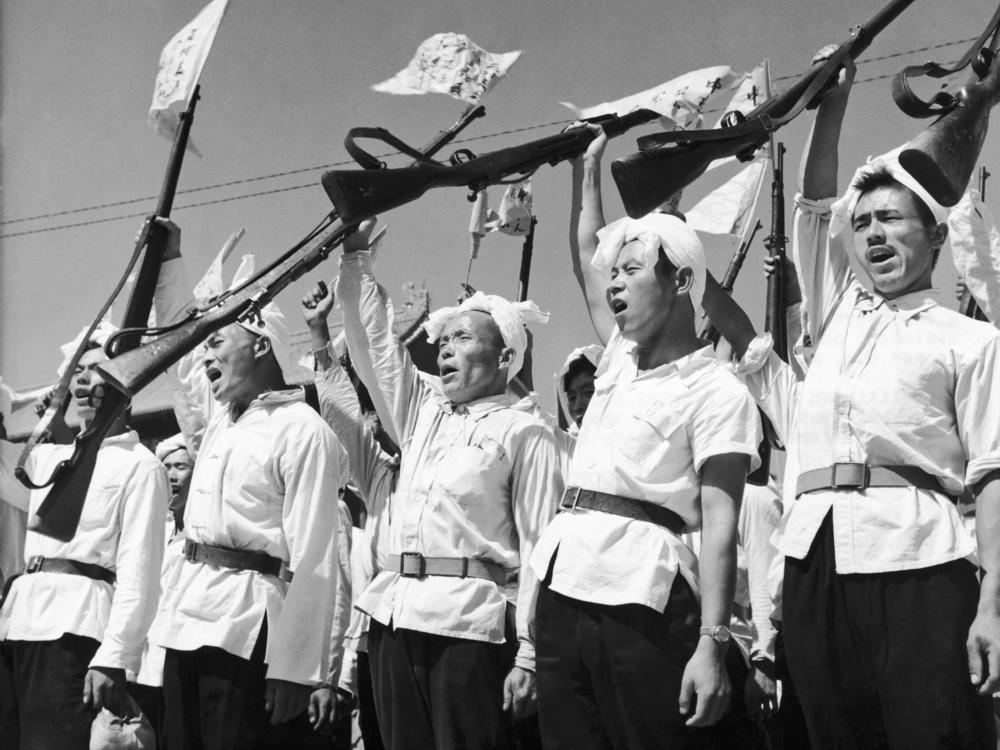 Young militiamen from China's collectivist commune of Fengtai protest against the U.S. bringing military aid to Taiwan, 1958.