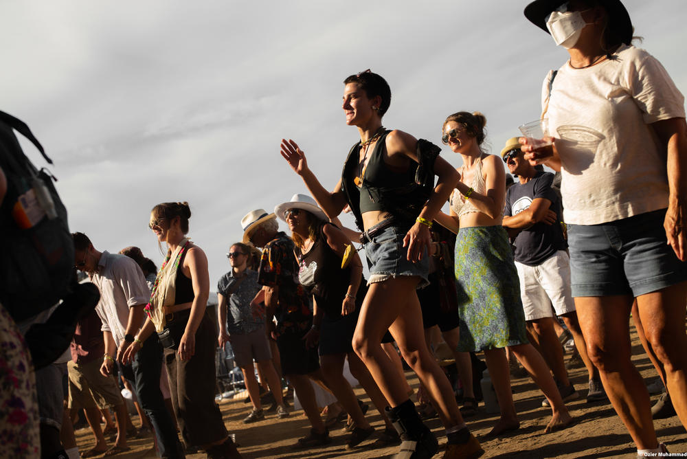 People dance in the crowd at the 2022 Newport Jazz Festival.