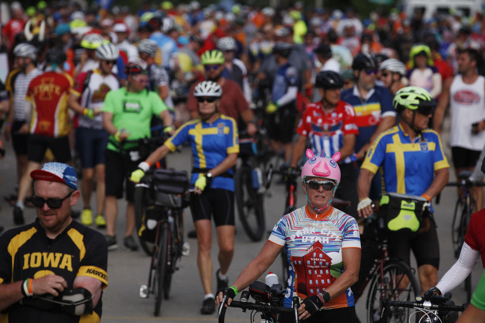 Thousands of riders flood the streets of downtown Schaller, Iowa, a town with a population of just over 700 people, on Monday, July 25, during Day 2 of RAGBRAI.