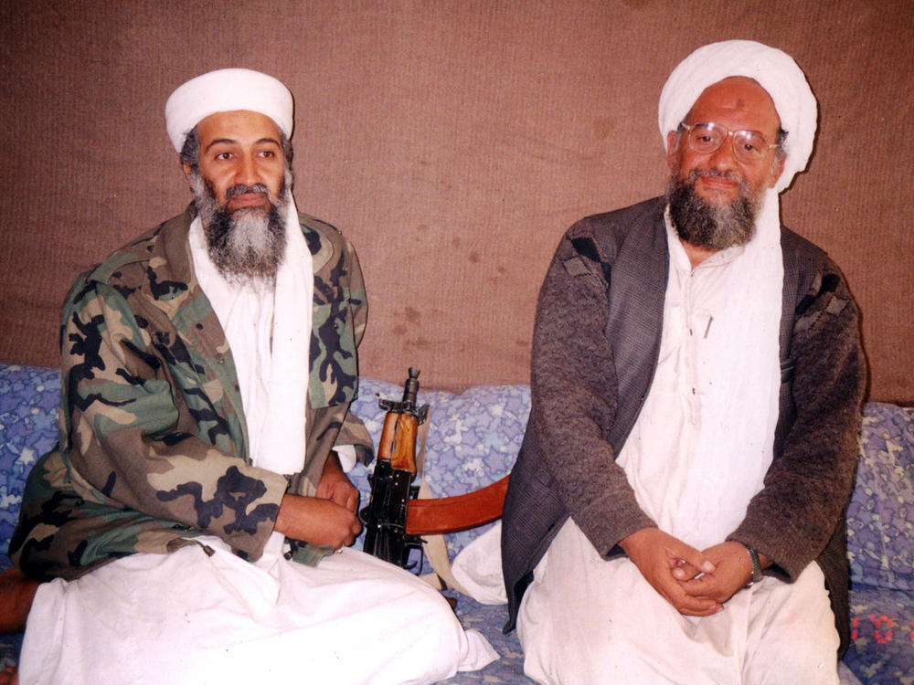 Osama bin Laden (left) sits with his No. 2, Ayman al-Zawahiri, for an interview that was published in November 2001, shortly after the 9/11 attacks. The U.S. says it killed al-Zawahiri in a drone strike in Kabul on Sunday.
