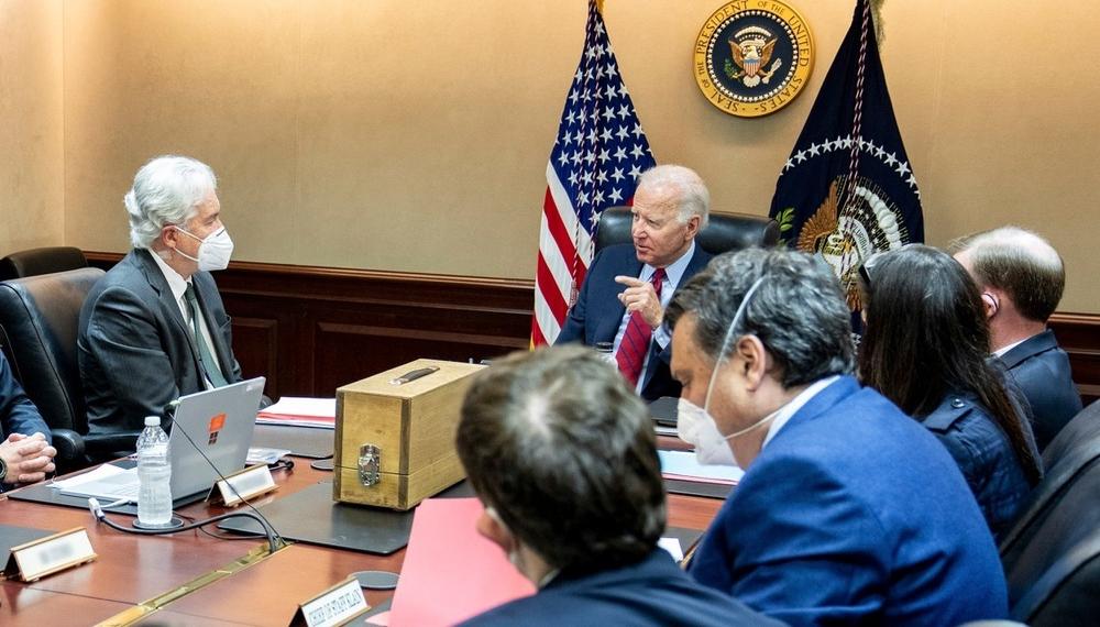 President Biden meets with his national security team on July 1 to discuss the drone strike that killed al-Qaida leader Ayman al-Zawahiri on July 31. The wooden box in front of the president contains a replica of the house where al-Zawahiri was living in Kabul, Afghanistan.