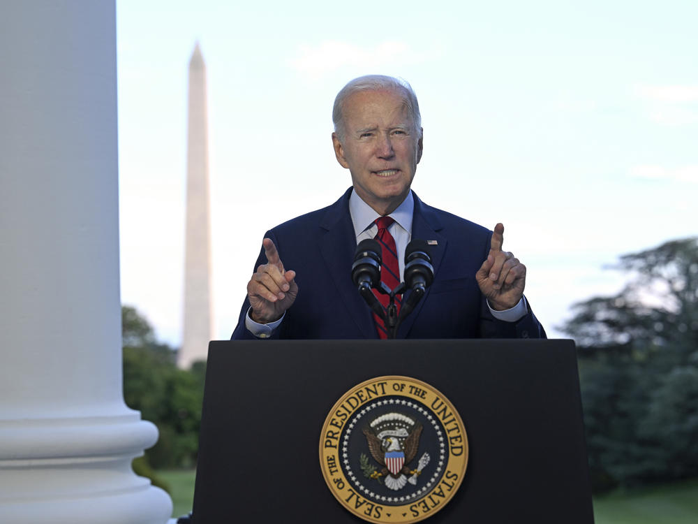 President Biden speaks from the Blue Room Balcony of the White House on Monday as he announces that a U.S. drone strike killed al-Qaida leader Ayman al-Zawahiri in Afghanistan.