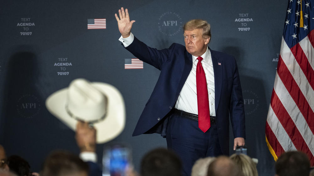 Former President Donald Trump acknowledges the crowd after speaking during the America First Agenda Summit on July 26 in Washington, D.C.