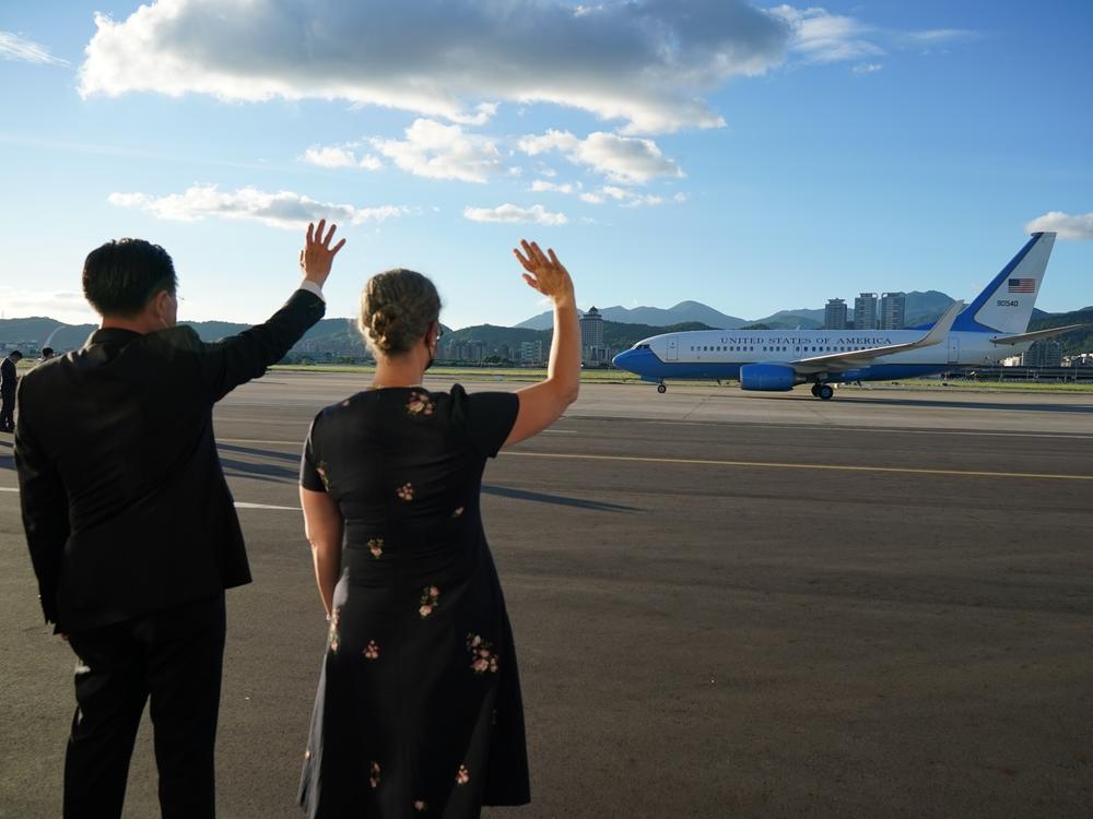 A plane carrying House Speaker Nancy Pelosi and her delegation departs Taipei on Wednesday.
