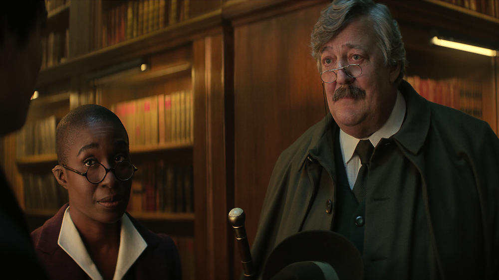 Shall we repair to the library?: (L to R) Vivienne Acheampong as Lucienne, Stephen Fry as Gilbert.