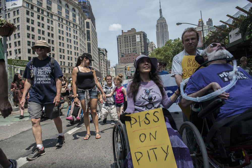 People participate in the first annual Disability Pride Parade, in July 2015, in New York City. The parade calls attention to the rights of people with disabilities and coincides with the anniversary of the Americans With Disabilities Act.