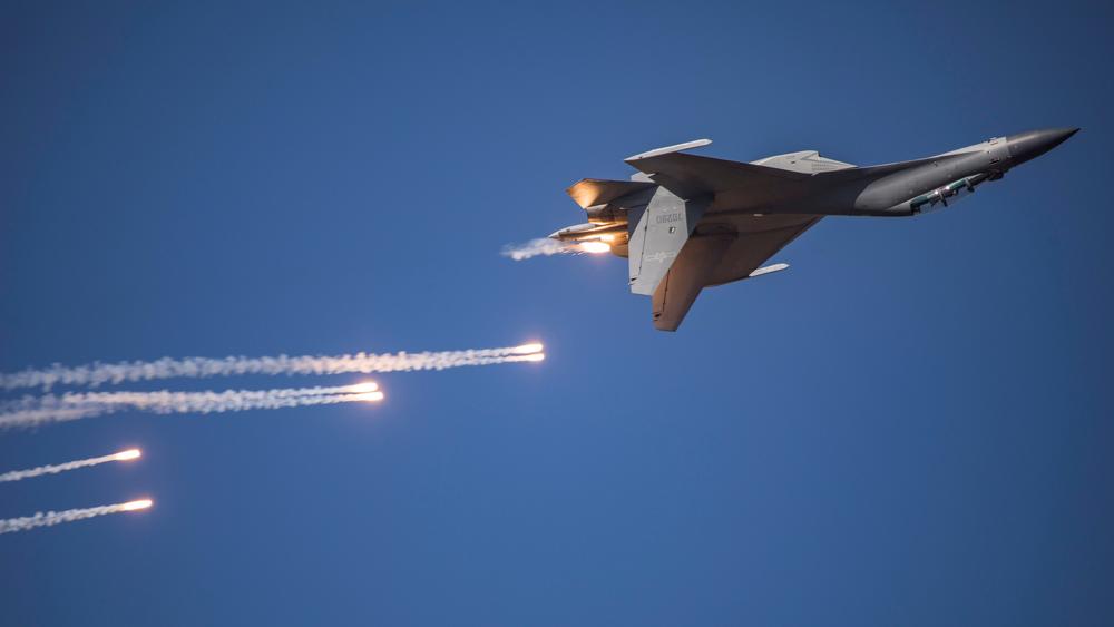 A J-16 fighter jet performing in the sky during the Chinese People's Liberation Army Air Force Aviation Open Day in Changchun in China's northeastern Jilin province, in 2019.