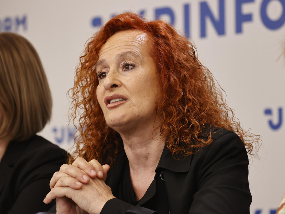 Senior Crisis Advisor of Amnesty International Donatella Rovera (center) released a report August 4, 2022 condemning the Ukrainian army for putting civilians at risk, a possible war crime.