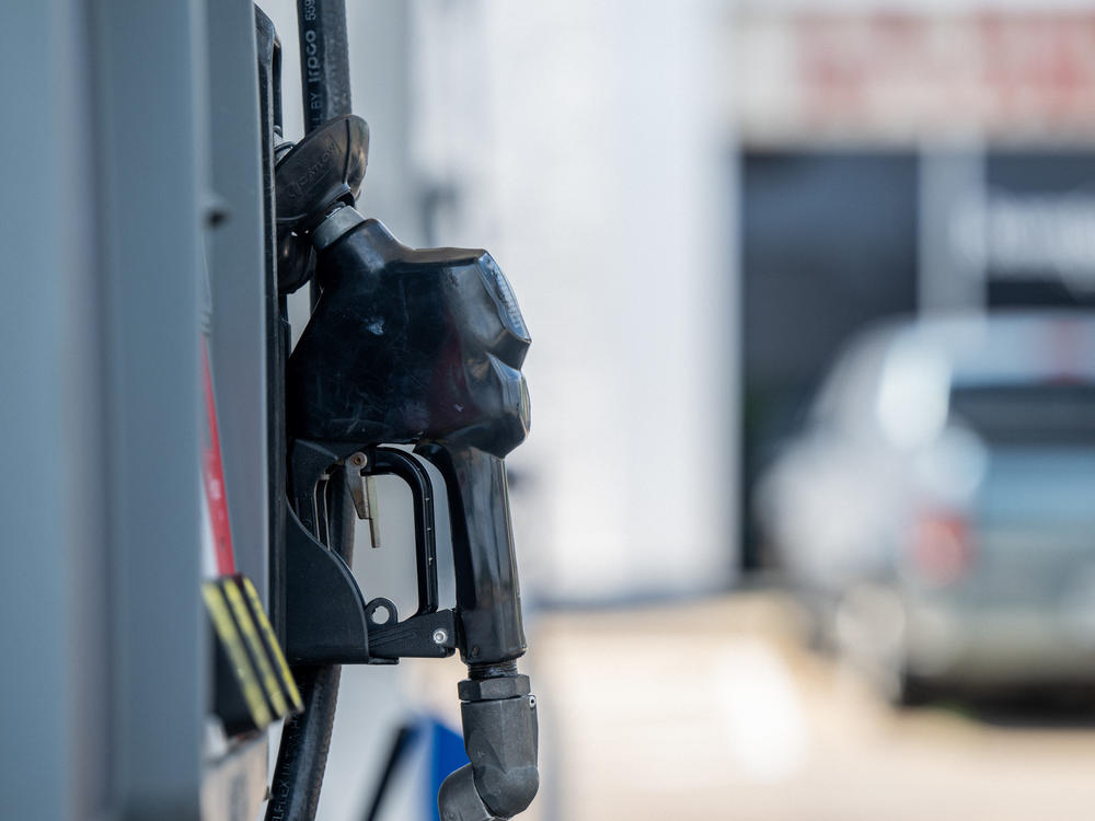 A gas pump is seen at a gas station in Houston on June 9. Gas prices have dropped below $4 a gallon in parts of the country, although the national average remains above that level.