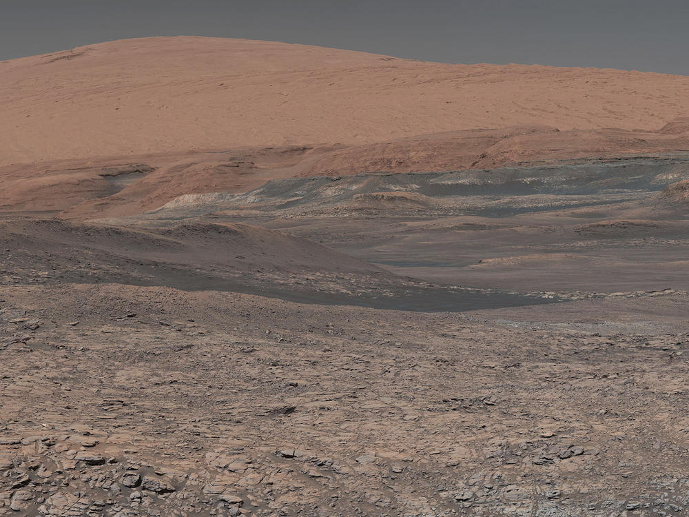 This image provided by NASA, assembled from a series of January 2018 photos made by the Mars Curiosity rover, shows an uphill view of Mount Sharp, which Curiosity had been climbing.