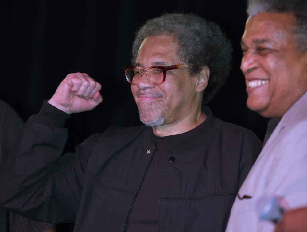 Woodfox (left) pumps his fist as he arrives on stage during his first public appearance after his release from Louisiana's Angola Prison earlier in the day in 2016.