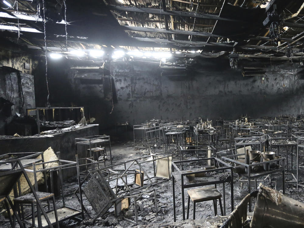 Major fire damage fills the interior at the Mountain B pub in the Sattahip district of Chonburi province, about 100 miles southeast of Bangkok, Thailand.