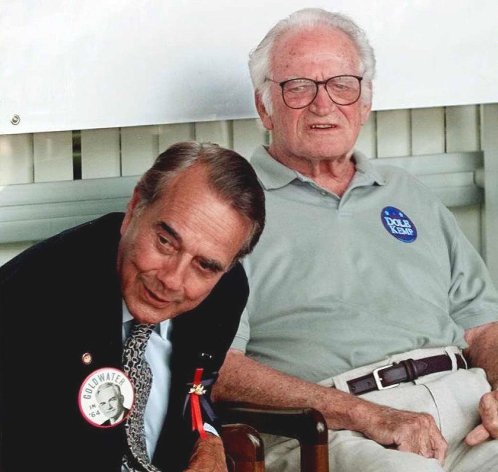 Bob Dole, then the Republican presidential candidate visits with former Sen. Barry Goldwater, on Sept. 17, 1996.