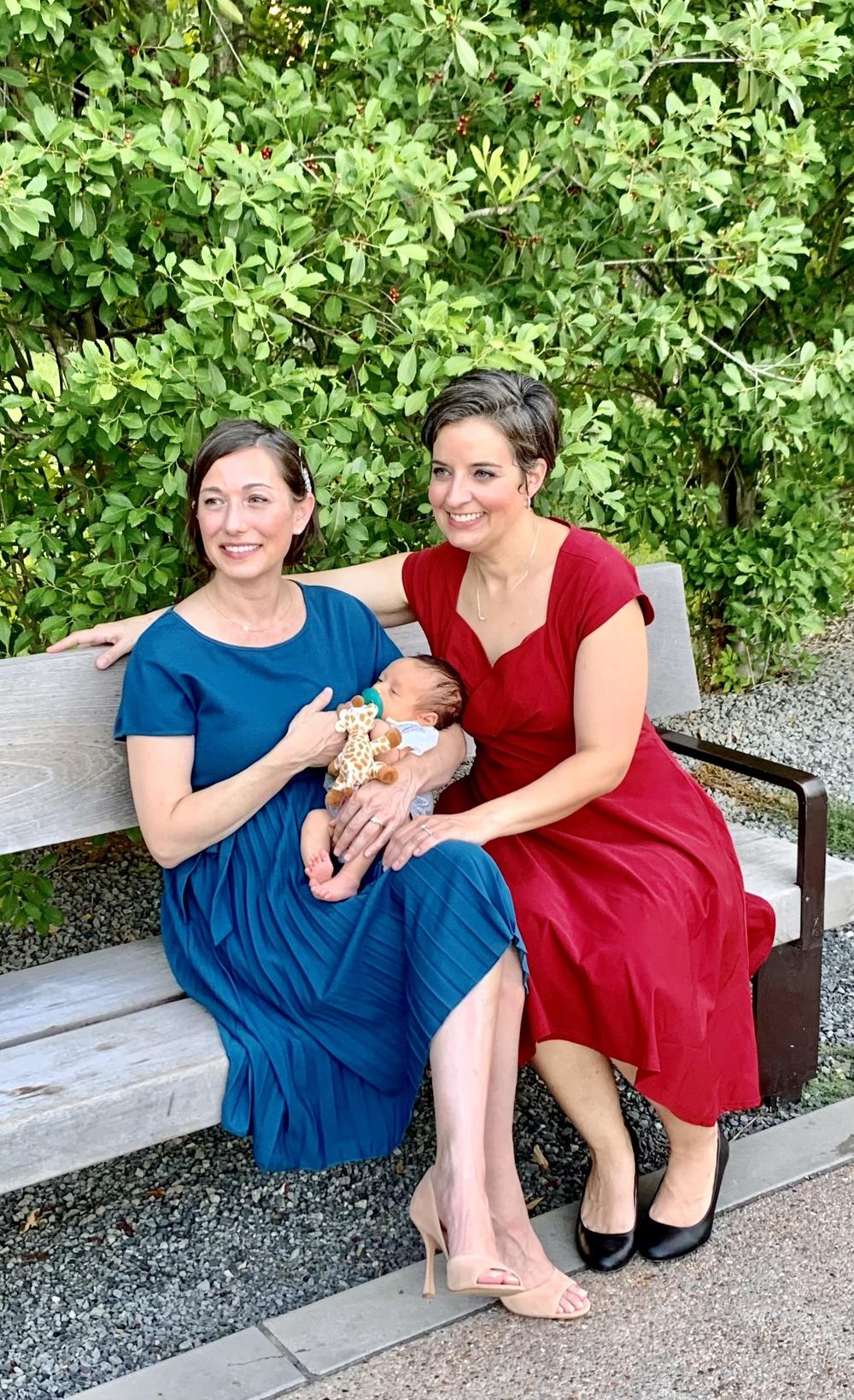 Now that the wedding is behind them, Molly Pela (right) can begin the adoption process of the couple's new son. Carlie Brown (left) gave birth to the boy six days before the Supreme Court's ruling overturning <em>Roe v. Wade</em>.