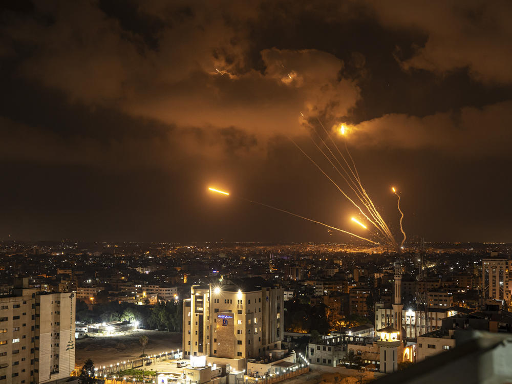 Rockets fired by Palestinian militants toward Israel, in Gaza City, on Friday. Palestinian officials say Israeli airstrikes on Gaza have killed at least 15 people.