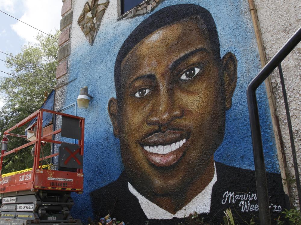 A painted mural of Ahmaud Arbery is displayed in Brunswick, Ga., on May 17, 2020, where the 25-year-old man was shot and killed in February.