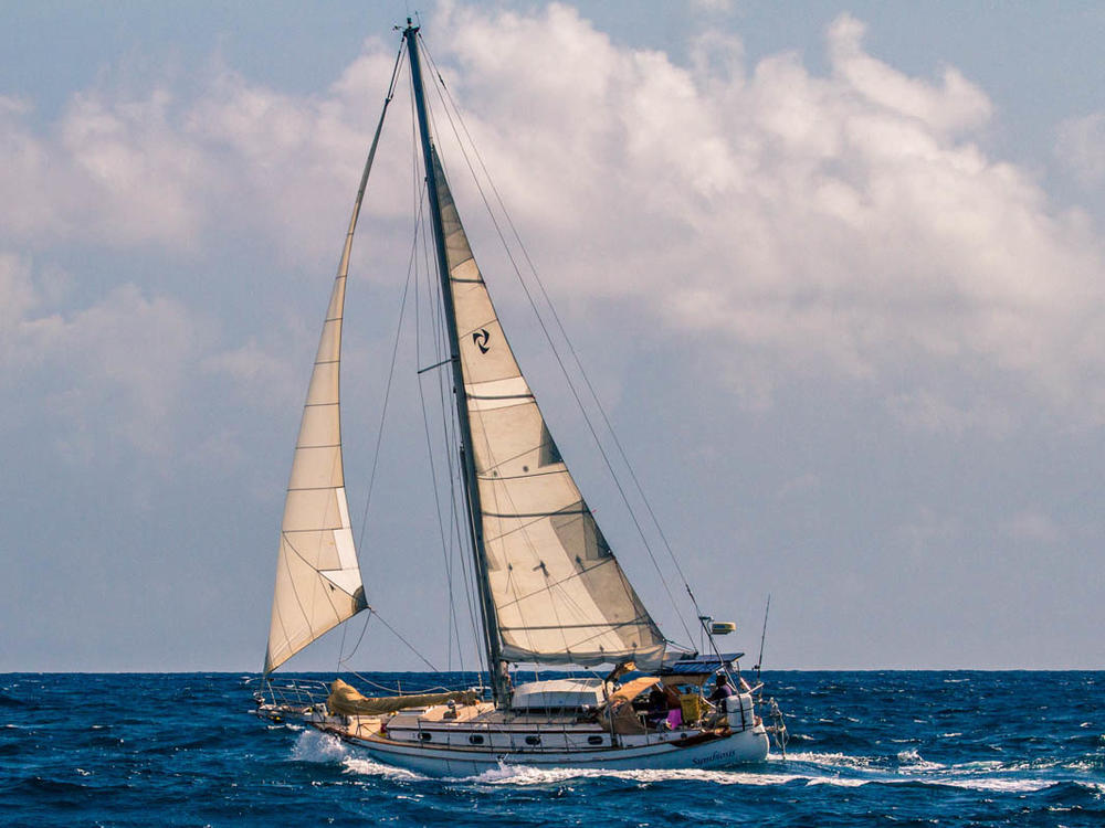 Author Scott Neuman's sailboat, Symbiosis, on passage between St. Lucia and Martinique in 2017.