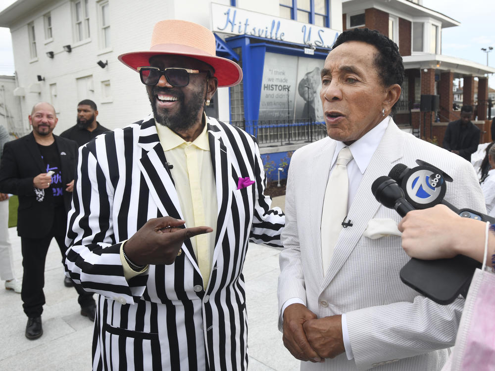 Original Temptation Otis Williams, left, and Smokey Robinson speak in front of the Motown Museum in Detroit, Monday, Aug. 8, 2022.