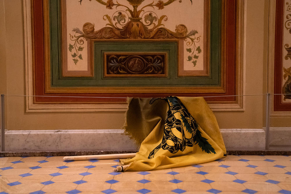 A discarded Gadsden flag inside the U.S. Capitol on Jan. 6, 2021.