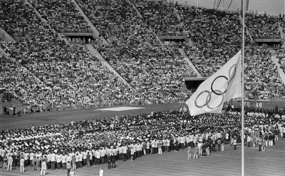 The Olympic flag flies at half-staff in the Olympic Stadium in Munich on Sept. 6, 1972, during the memorial service for the members of the Israeli Olympic team who were killed. International Olympic Committee President Avery Brundage declared that the 