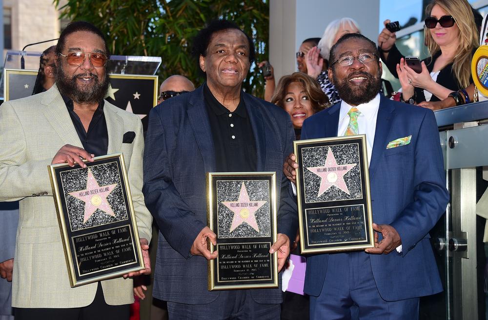 (From left) songwriters Eddie Holland, Lamont Dozier, and Brian Holland pose at their Hollywood Walk of Fame Star ceremony in 2015.