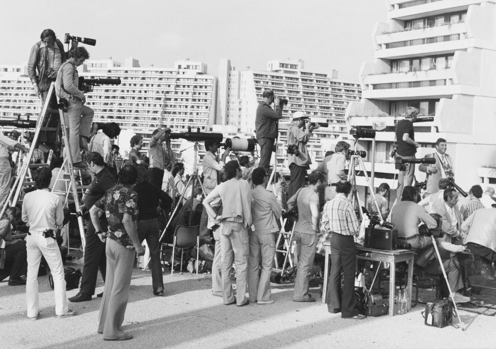 Photographers gather after the Munich massacre near the building where the Israeli team had been held hostage in September 1972. About 900 million people watched the terrorist attack on television.