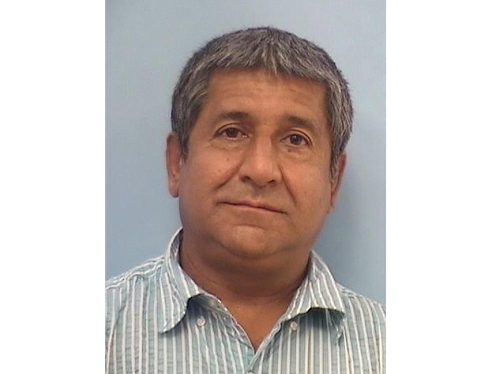 Muhammad Syed, 51, was taken into custody Monday in connection with the killings of four Muslim men in Albuquerque, N.M., over the last nine months. He faces charges in two of the deaths and may be charged in the others.