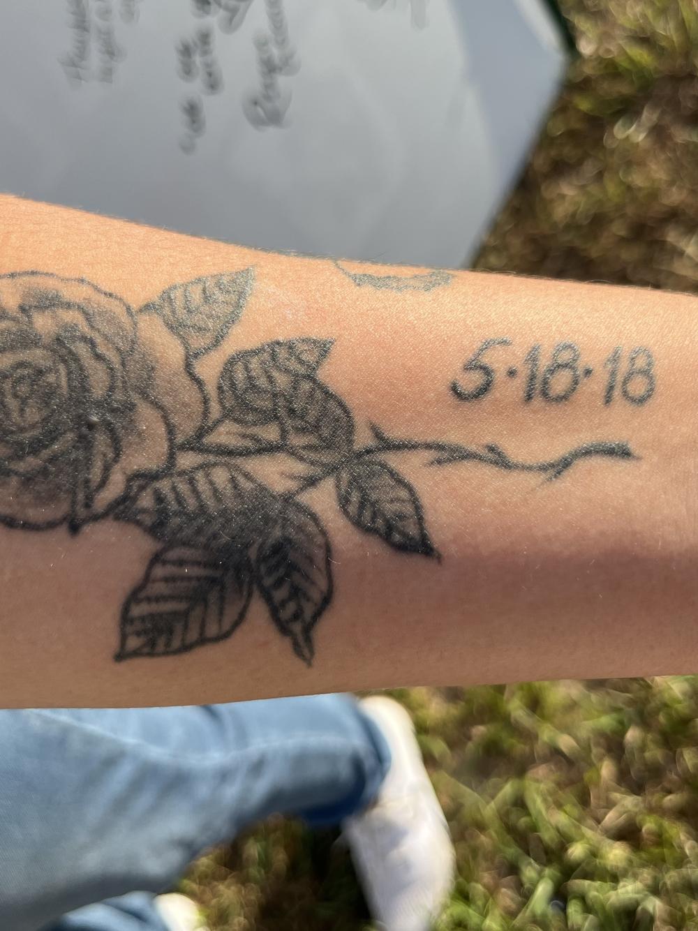 Reagan Gaona's rose tattoo includes the date of the Santa Fe High School shooting: May 18, 2018. Her boyfriend, Chris Stone, was among those killed.
