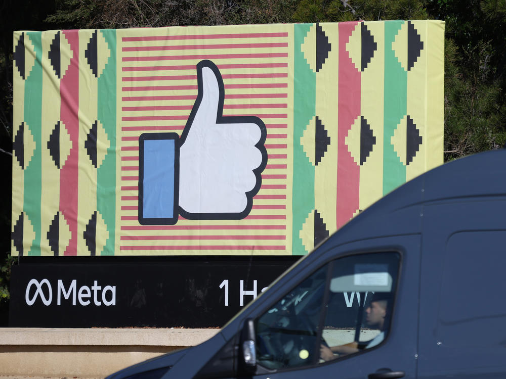 A sign in displayed in front of Meta headquarters in Menlo Park, Calif., on Feb. 2. Meta, Facebook's parent company, reported a 1% decline in revenue in the most recent quarter.