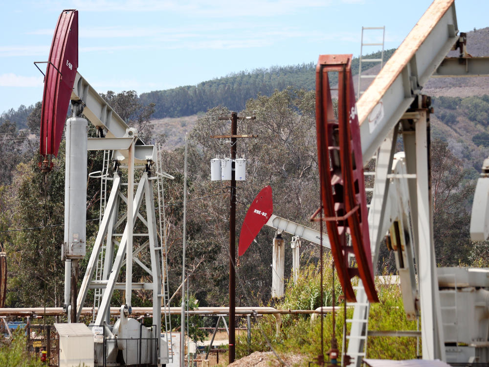 Oil pumpjacks operate near Ventura, Calif., on Aug. 5. Oil producers have ramped up output after crude prices surged this year.