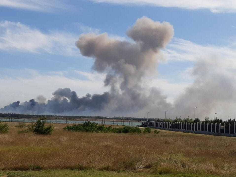 Smoke rises after explosions were heard from the direction of a Russian military airbase near Novofedorivka, Crimea, in this still image obtained by Reuters Tuesday.