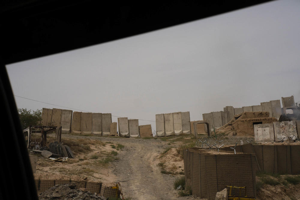 Blast walls can be seen on the roadside while driving on Highway 1 through Wardak province.