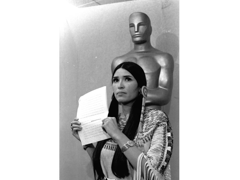 Sacheen Littlefeather appears at the Academy Awards ceremony to announce that Marlon Brando was declining his Oscar as best actor for his role in <em>The Godfather</em>, on March 27, 1973.