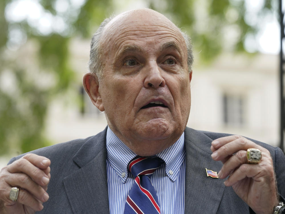 Former New York City mayor Rudy Giuliani speaks during a news conference on June 7, 2022, in New York. Giuliani's lawyer says prosecutors in Atlanta have said Giuliani is a target of their criminal investigation into possible illegal attempts by then-President Donald Trump and others to interfere in the 2020 general election in Georgia.