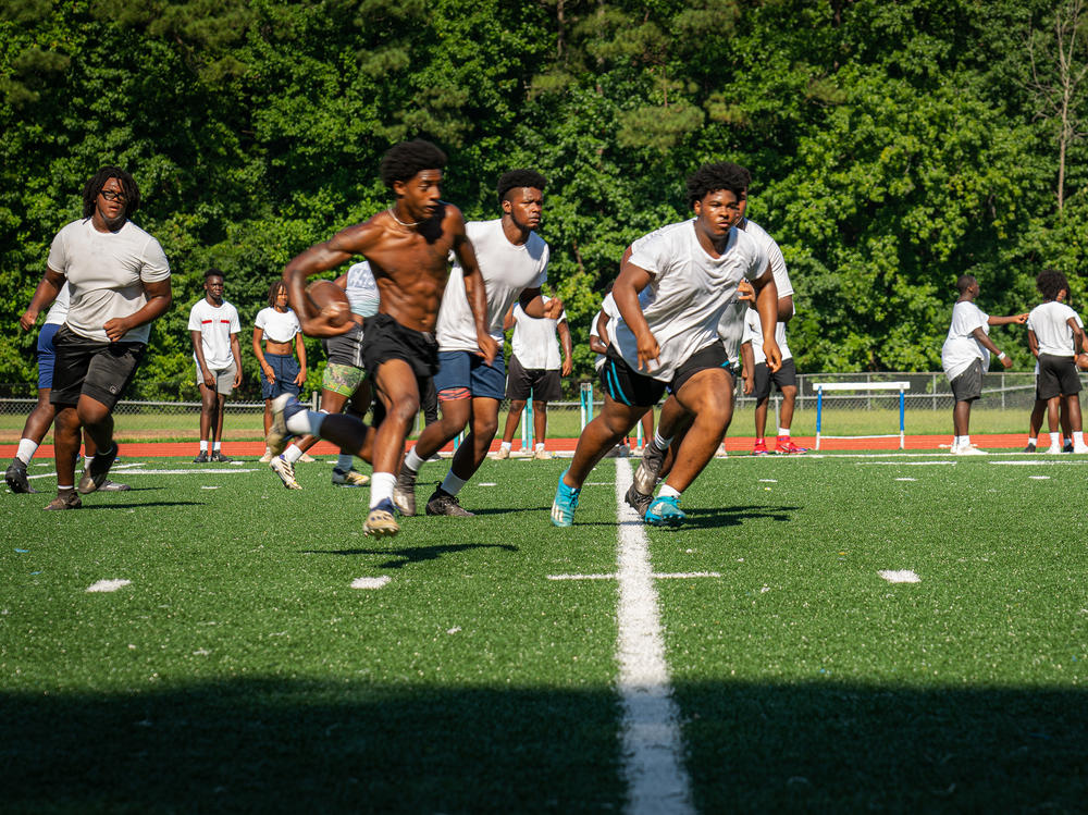 Football players at Cedar Grove High School in DeKalb County start practice in late July without pads to give them an acclimatization period to get used to the heat. This is a statewide rule from the Georgia High School Association.