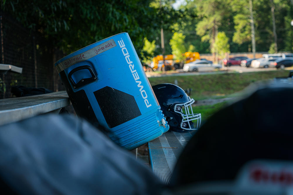 The Cedar Grove football team has a shady place to take their breaks.