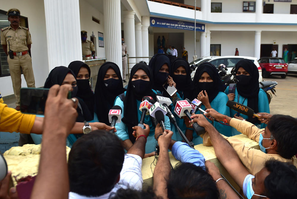 Muslim students speak to media after they were not allowed to enter pre-university colleges while wearing the hijab, in Udupi town, Karnataka, India, on Feb. 16.