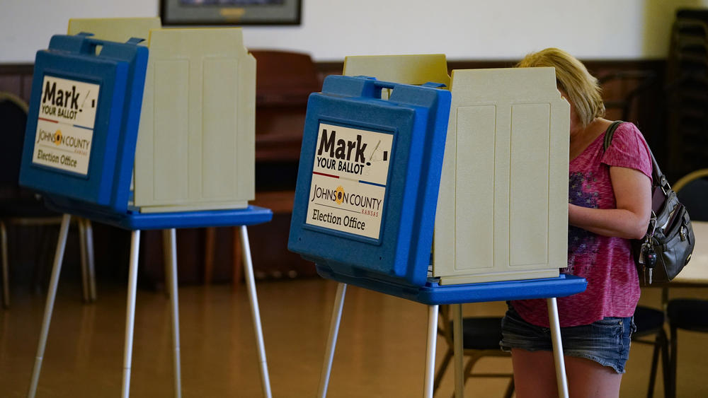 A voter casts a ballot in the Kansas primary on August 2, when Kansans voted resoundingly to keep abortion legal.