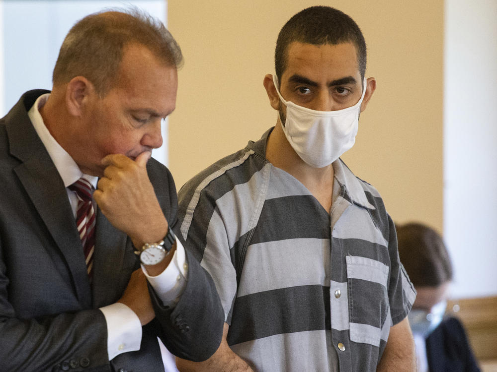 Defense attorney Nathaniel Barone (left) and Hadi Matar, who was charged with stabbing author Salman Rushdie, listen during an arraignment Thursday in the Chautauqua County Courthouse in Mayville, N.Y.