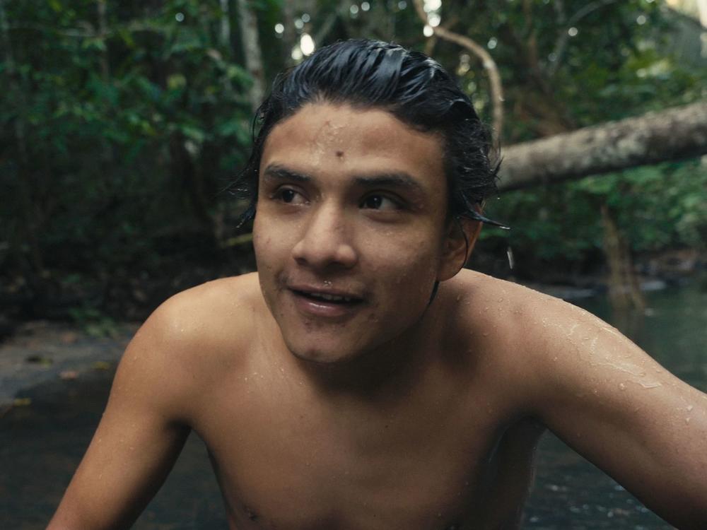 Bitaté swims in a river near his village in the Amazon rainforest.