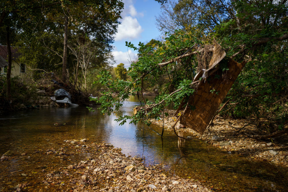 Debris still litters Trace Creek in Waverly, Tennessee, in October 2021, over 2 months after the deadly flood.