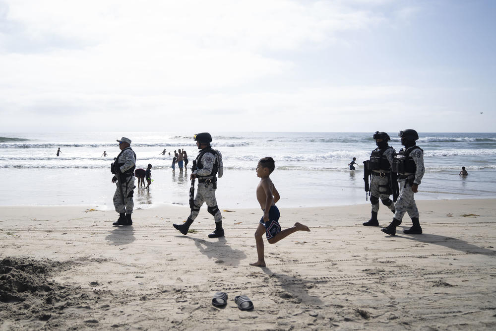 Members of the National Guard patrol a beach in Playas de Tijuana on August 16.